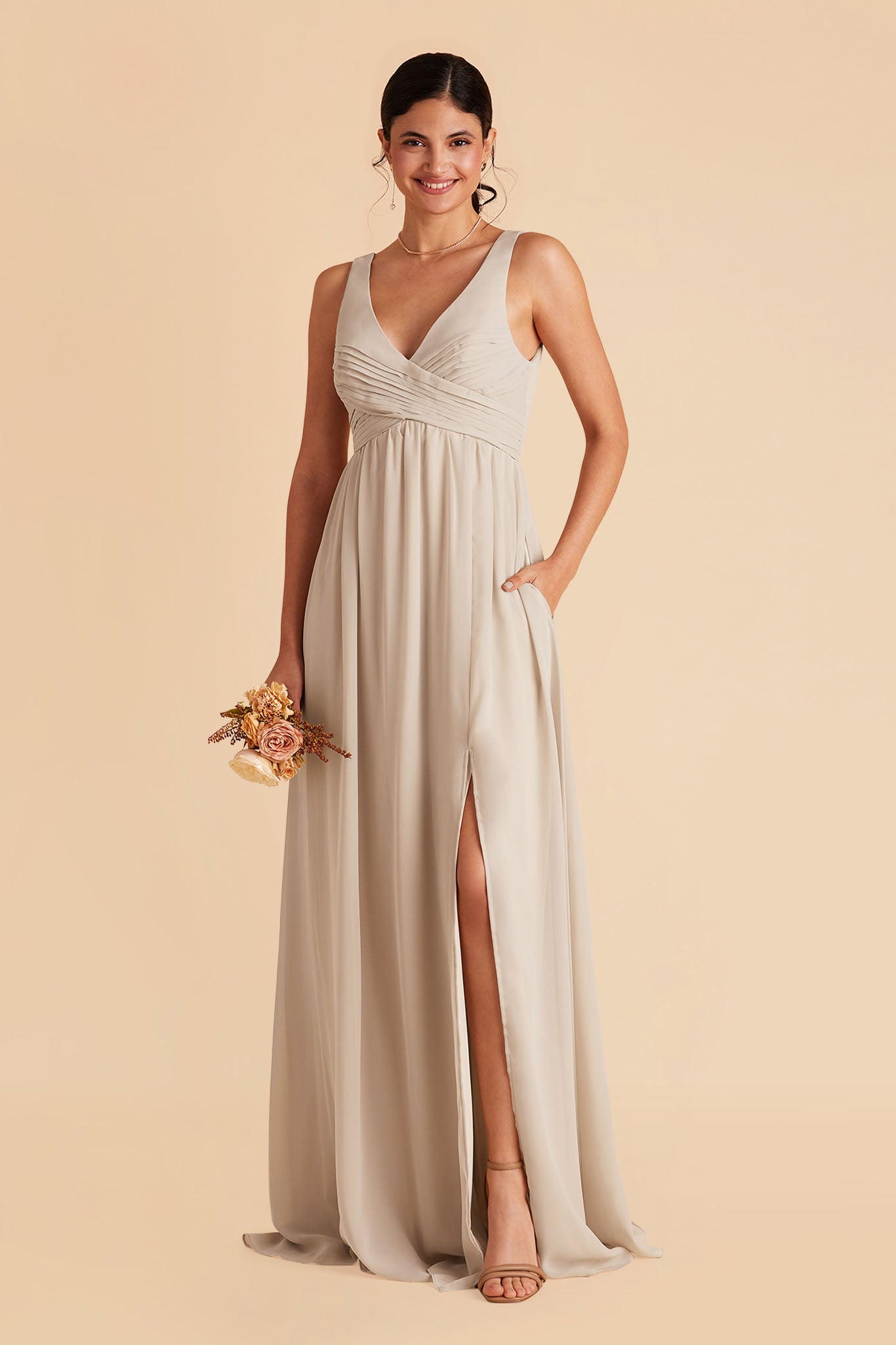 Laurie Empire maternity bridesmaid dress with slit in neutral champagne by Birdy Grey, front view