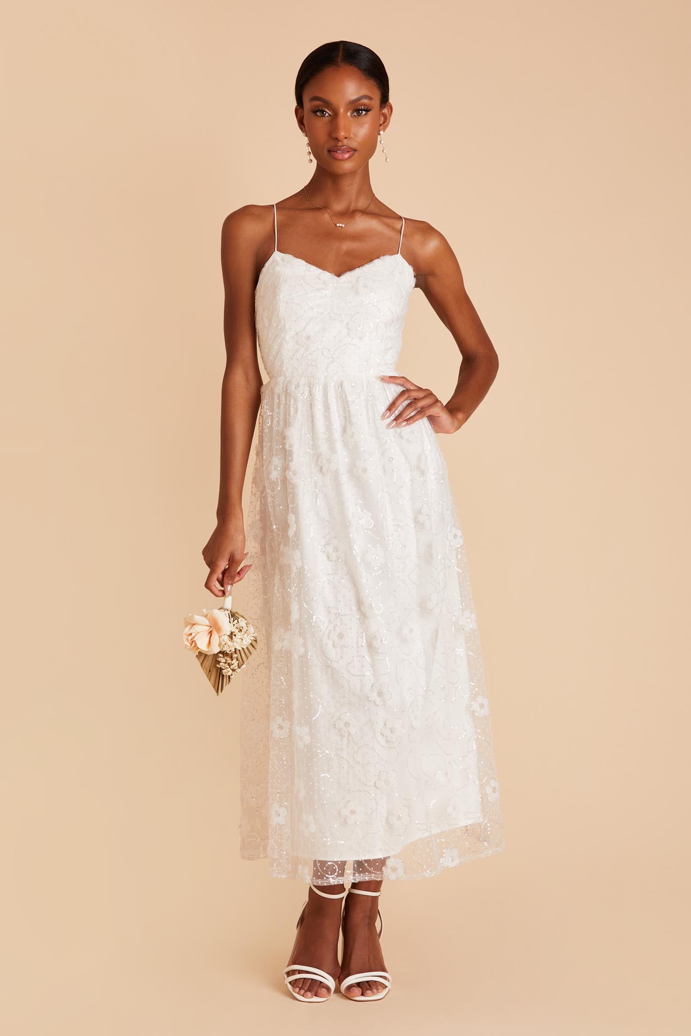 White dress shop midi length