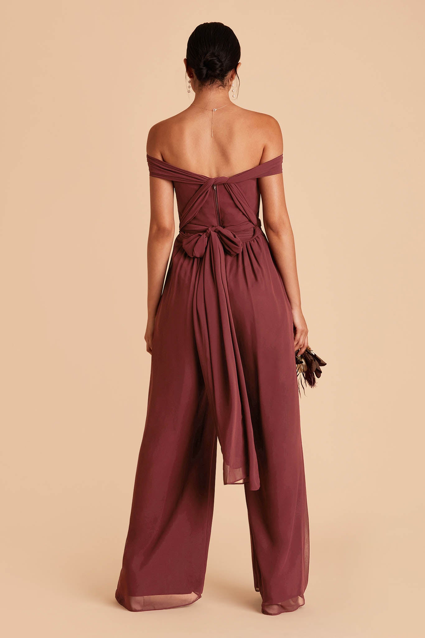 Red wedding jumpsuit with convertible neckline and tie in the back